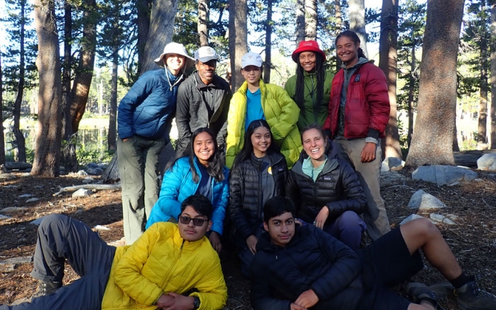 a group of students pose for a photo on a backpacking trip for bipoc teens 